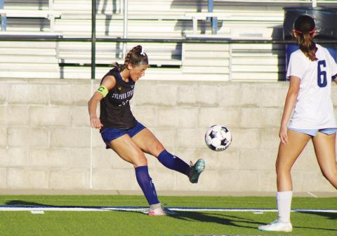 Jolea Moore (10) kicks the ball during the Lady Wildcats' Bi-District Playoff Game against Lindale this past season. Moore made the Texas High School Coaches Association Academic All-State Team for her performance in the classroom throughout high school. Staff Photo by DJ Spencer