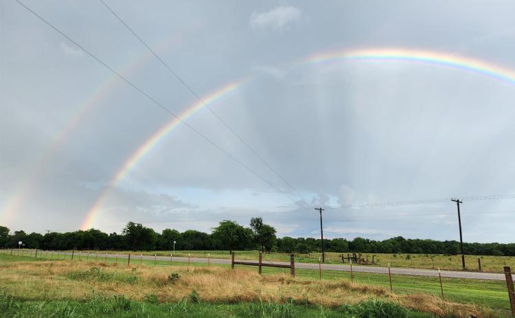 DOUBLE RAINBOW — Between downpours Thursday, this double rainbow was visible east of Sulphur Bluff, in Nelta near the community center. Photo submitted by Susan Neal