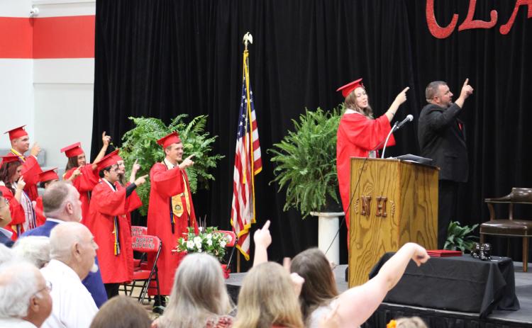 North Hopkins High School Senior Class of 2026 valedictorian Cadence Money leads the graduates in the North Hopkins school song one last time during commencement exercises Saturday, May 16.