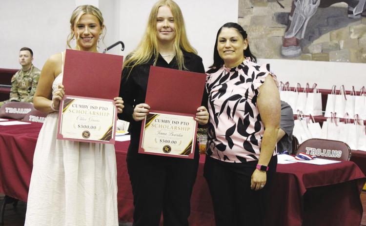 Chloe Groves (left) and Jenna Bearden (middle) received the Cumby Collegiate ISD PTO Scholarship, worth $500. Mary Ugalde presented the scholarships.